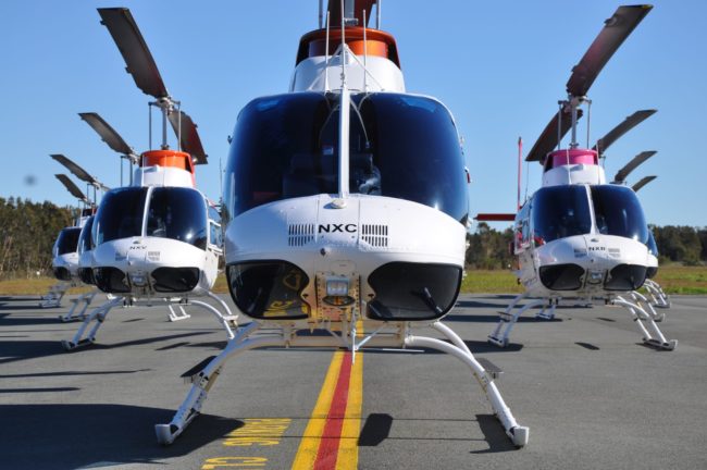 Front view of the B206BIII Jet Ranger fleet in formation
