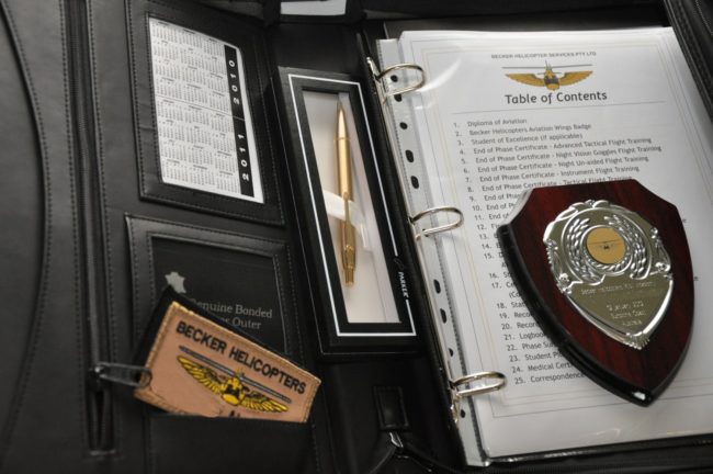 Graduation Folder showing Certificates received on completion of the Initial Entry Rotary Wing Pilot Program