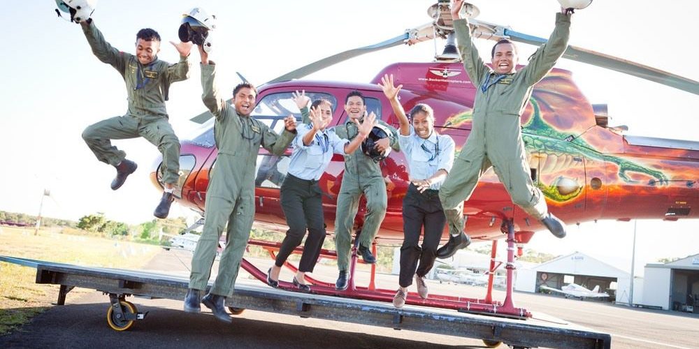 Becker Helicopters pilot trainees jumping from a helicopter for fun