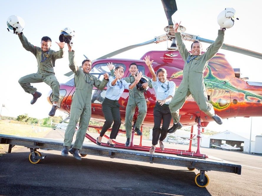 Becker Helicopters pilot trainees jumping from a helicopter for fun